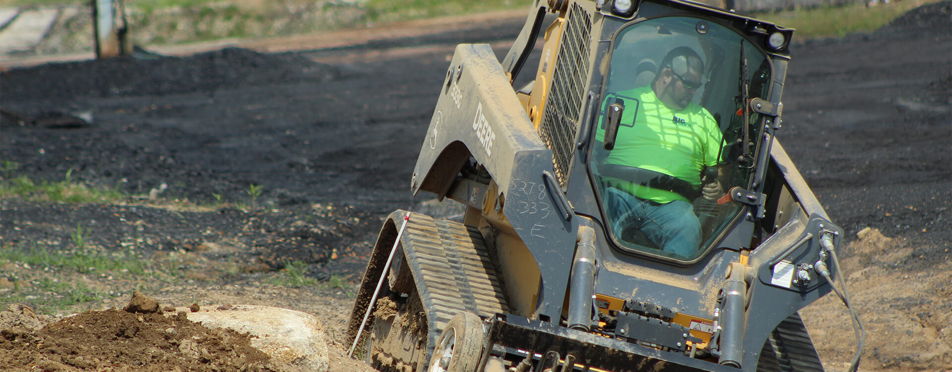 Big Greens land clearing professional using heavy equipment on a job in Ohio.