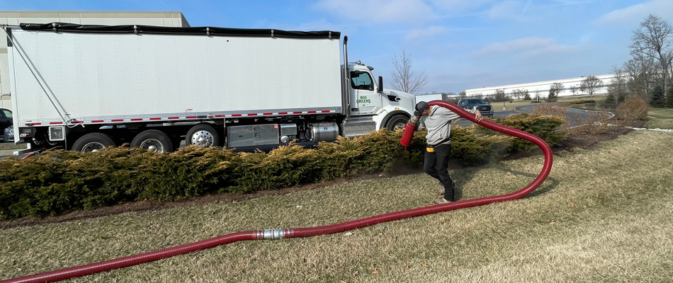 Mulch blowing being serviced for commercial property in Kentucky.