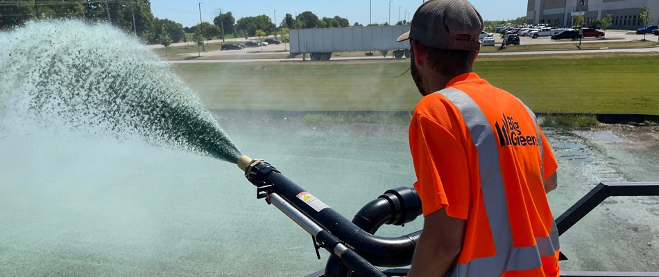 A professional on blower truck performing a hydroseeding service in Ohio.